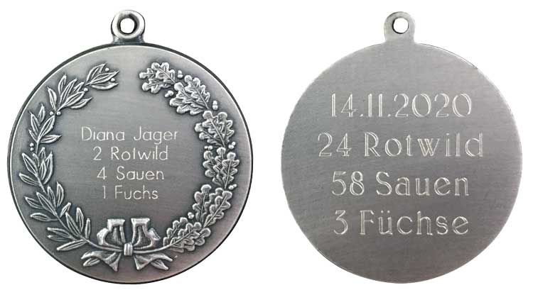 Gravurvergleich zwischen Medaille TS-EDITION und Medaille mit Kranz