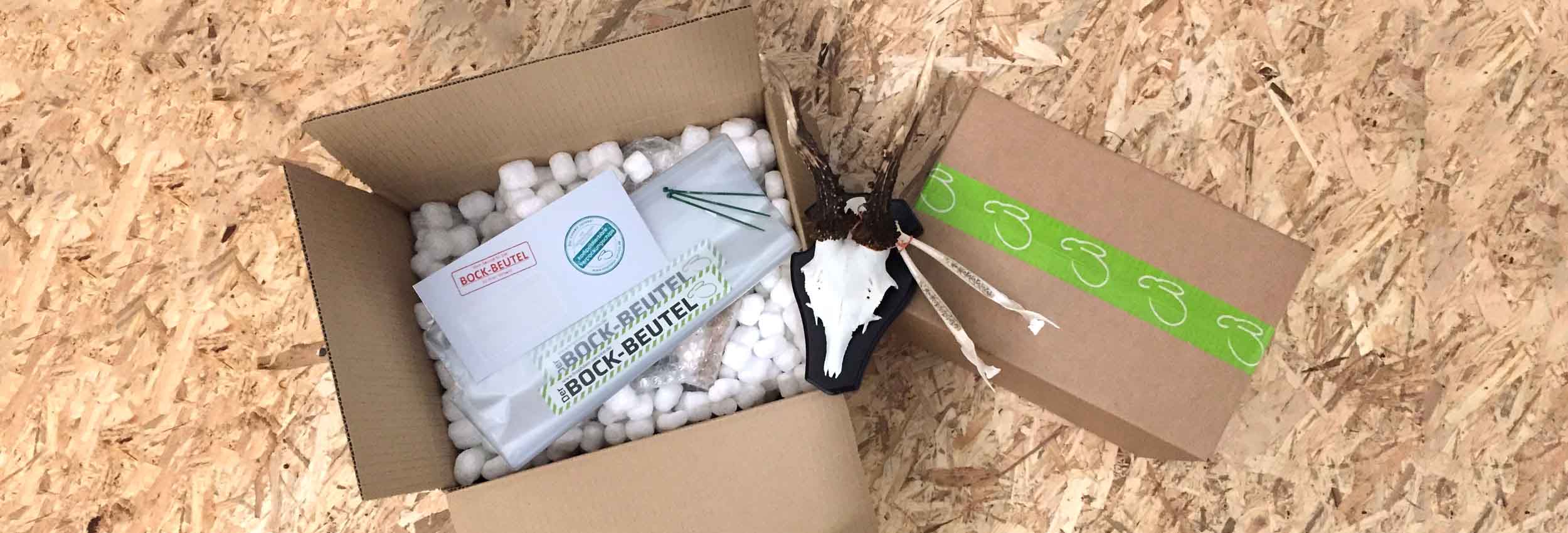 Rücksendepaket mit Trophäen und Bockbeutel